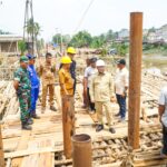 Pj Bupati Apriyadi Bangun Jembatan Hingga Perbaiki 36 Kilometer Jalan di Lalan